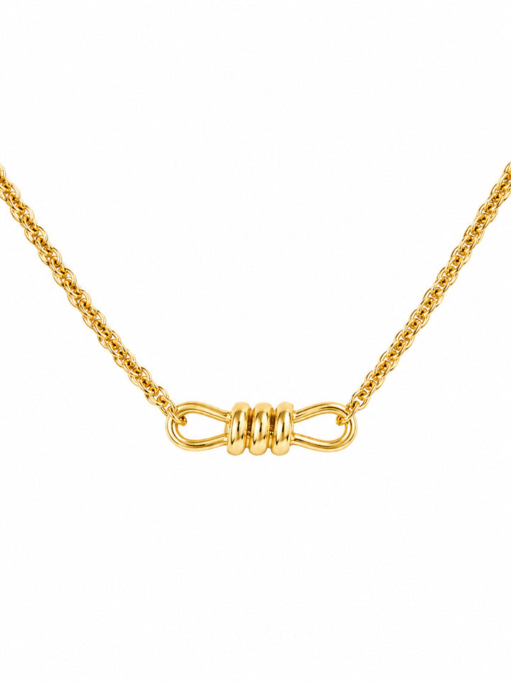Aella gold knot necklace with sculptural chain detail