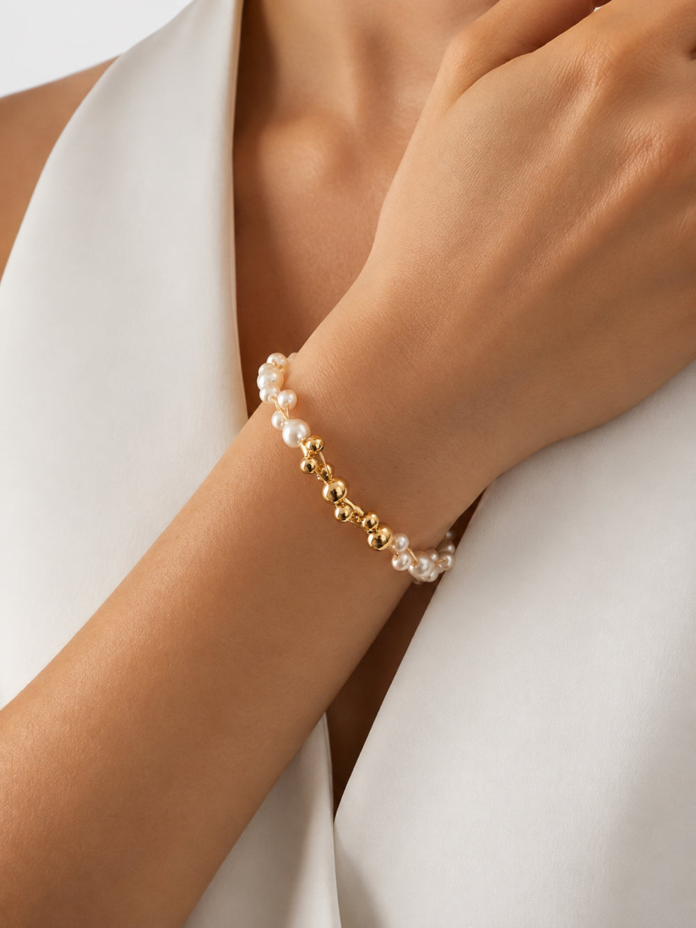 Alyssa pearl bracelet styled on wrist
