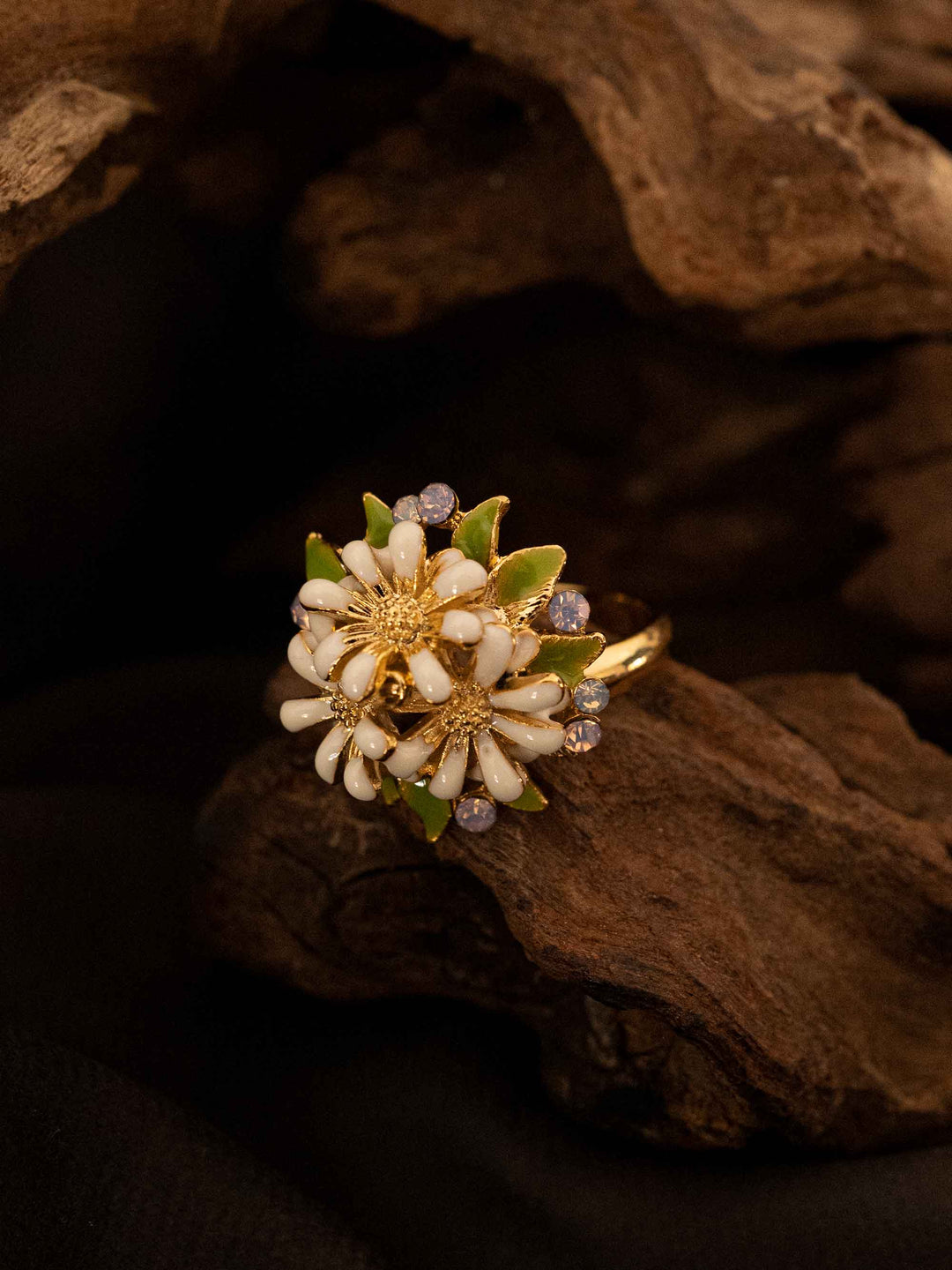 A cold enamel white flower ring