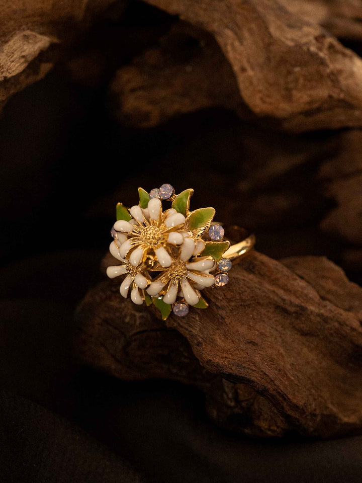 A cold enamel white flower ring