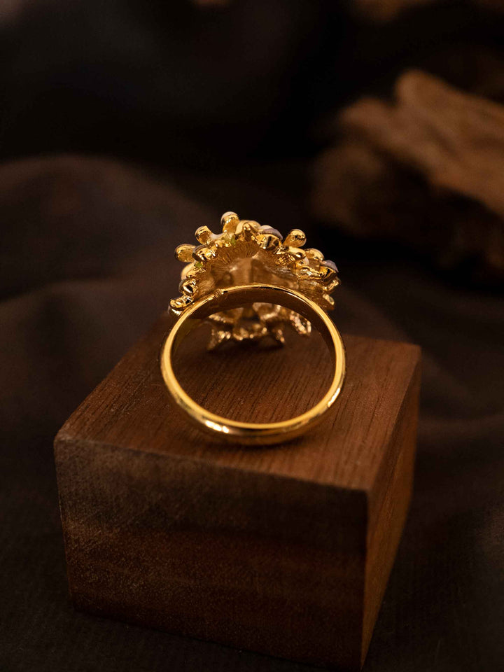 A cold enamel white flower ring