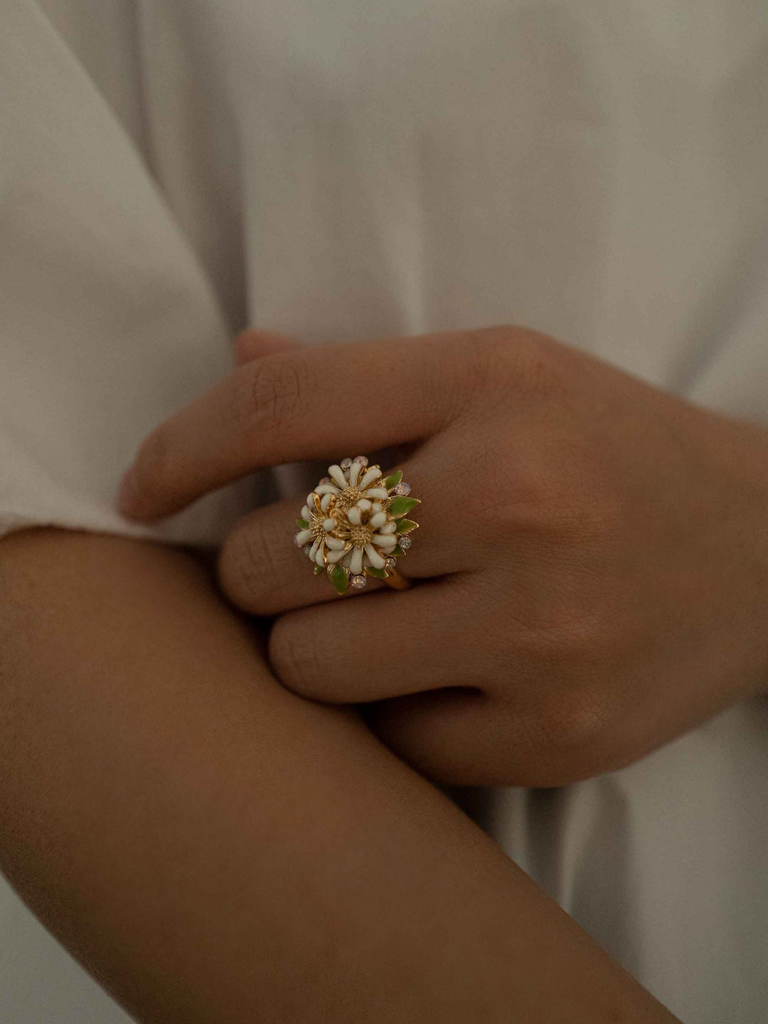 a model A cold enamel white flower ring