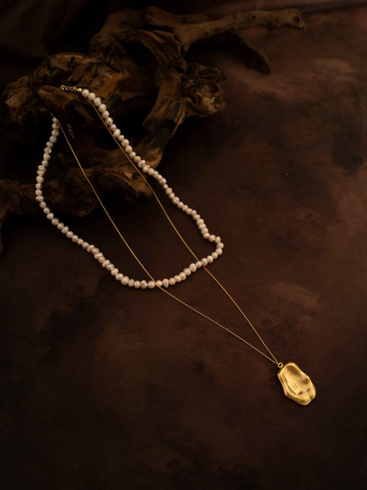A double layer pearl plated 18k gold necklace