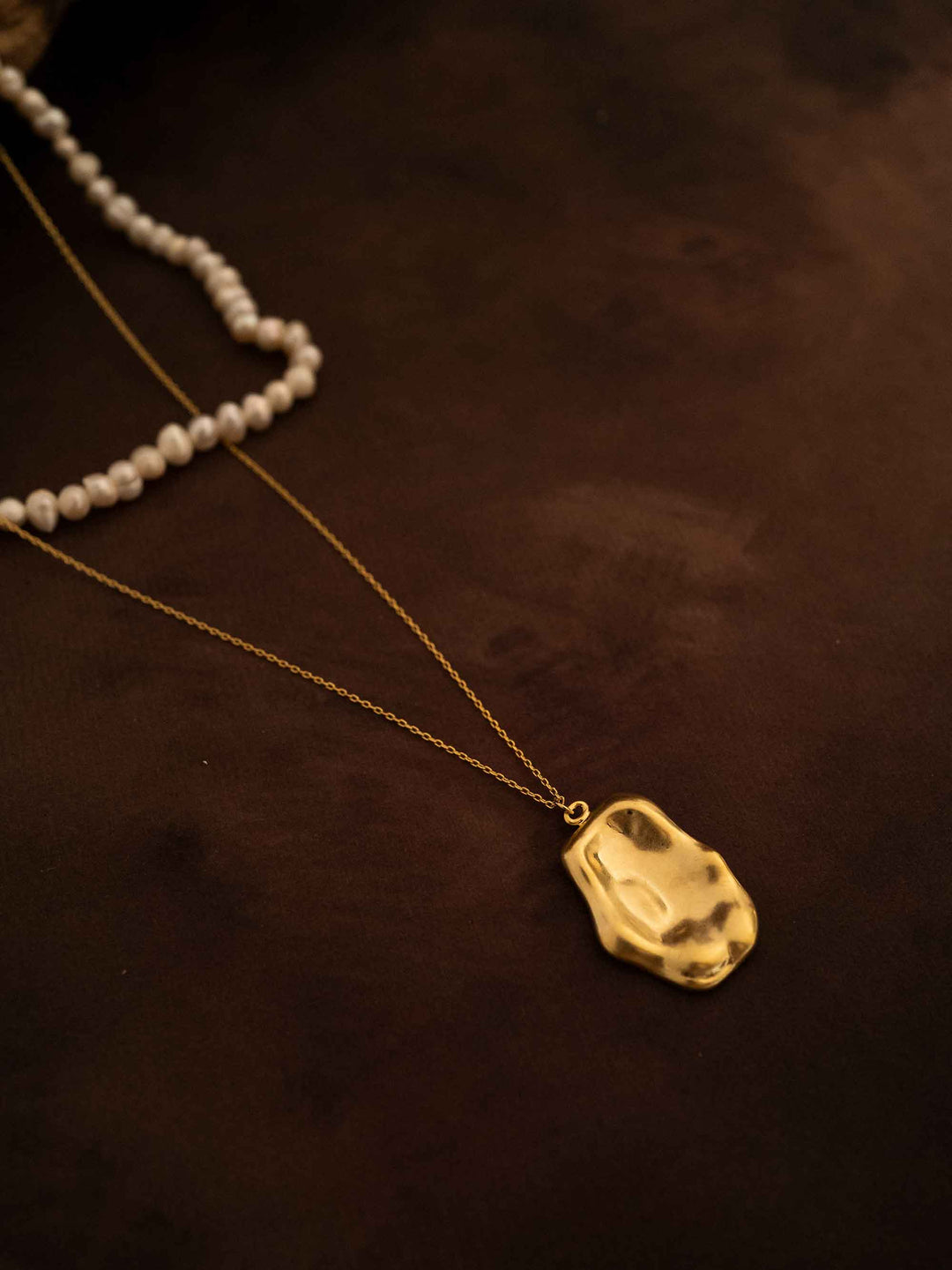 A double layer pearl plated 18k gold necklace