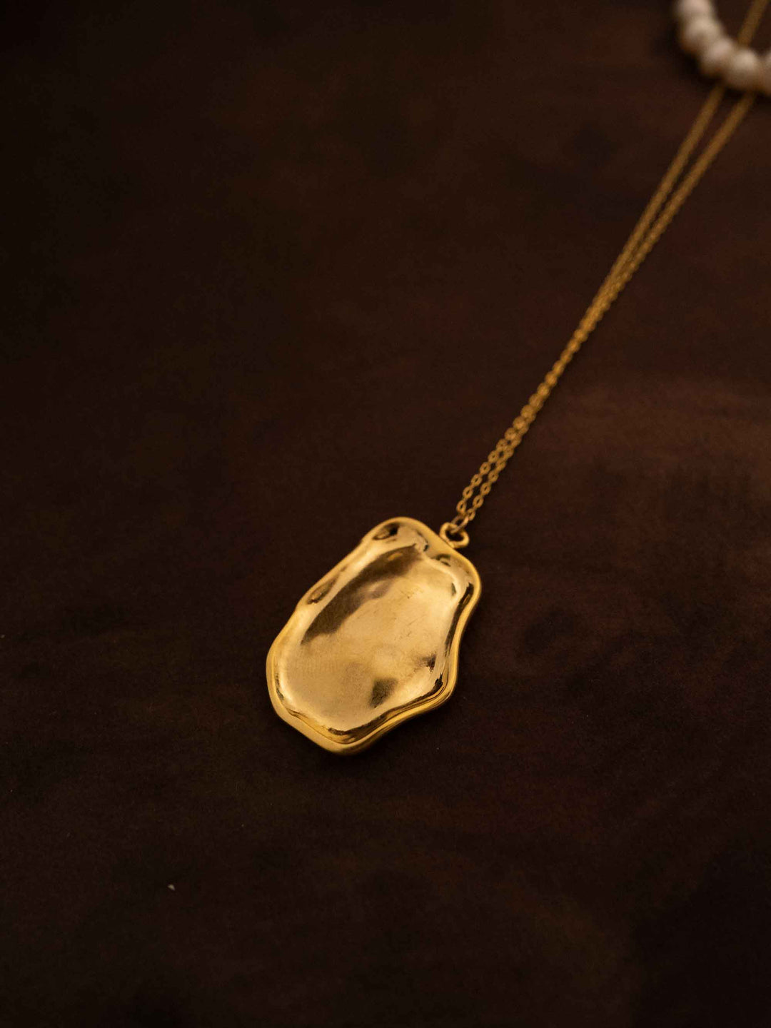 A double layer pearl plated 18k gold necklace