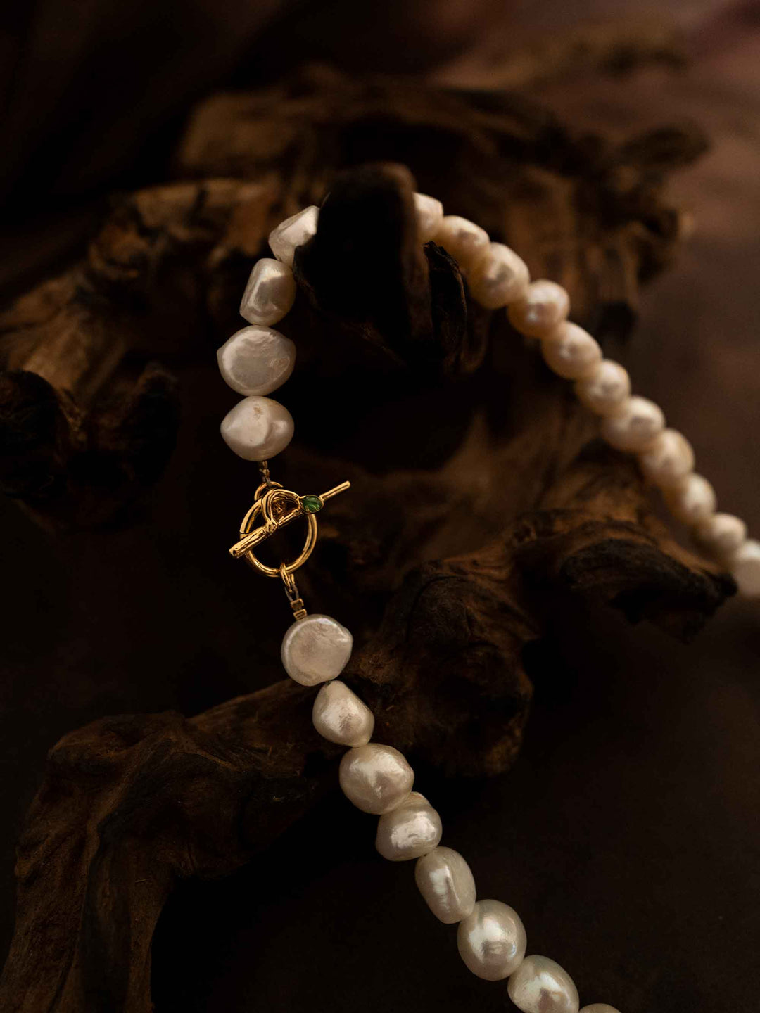 A necklace of natural stones and pearls