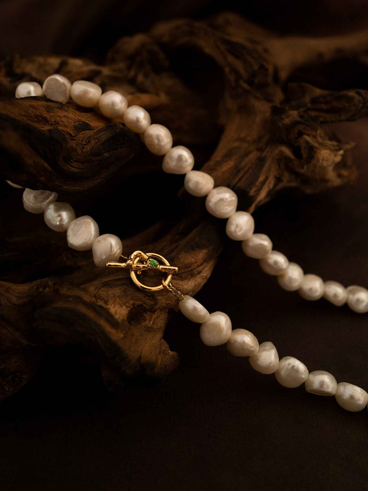 A necklace of natural stones and pearls
