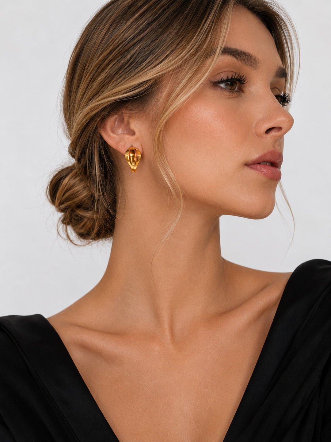 Elara hoop earrings styled on model