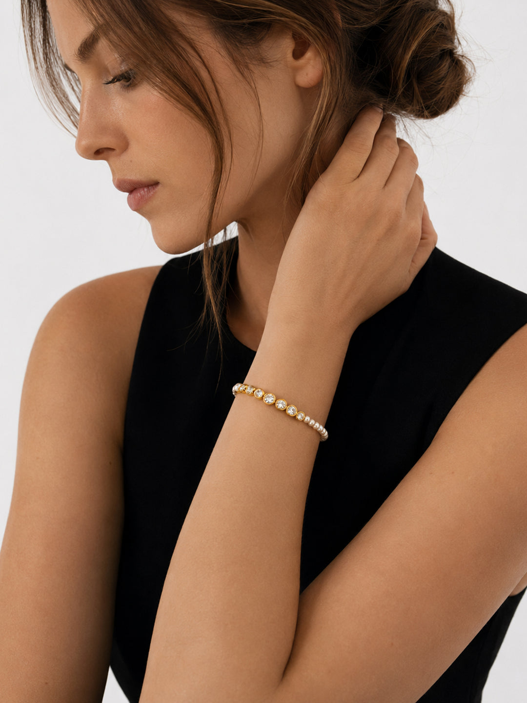 Pearl and crystal bracelet worn with black outfit