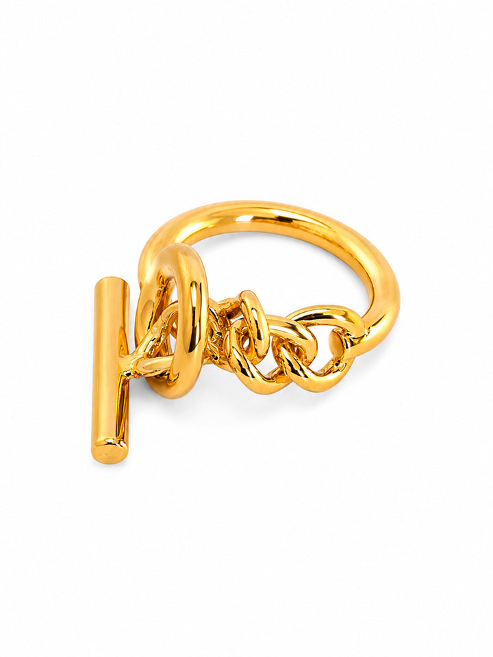 Gold-plated chain-inspired ring worn with black outfit