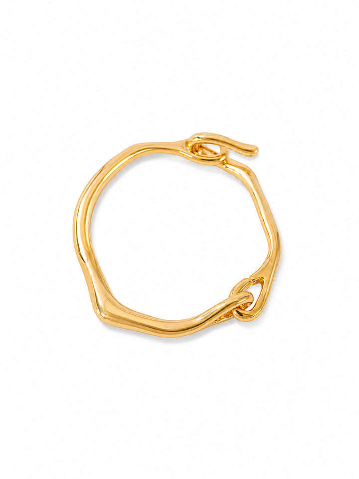 Irregular hook bracelet with sculptural gold-plated design