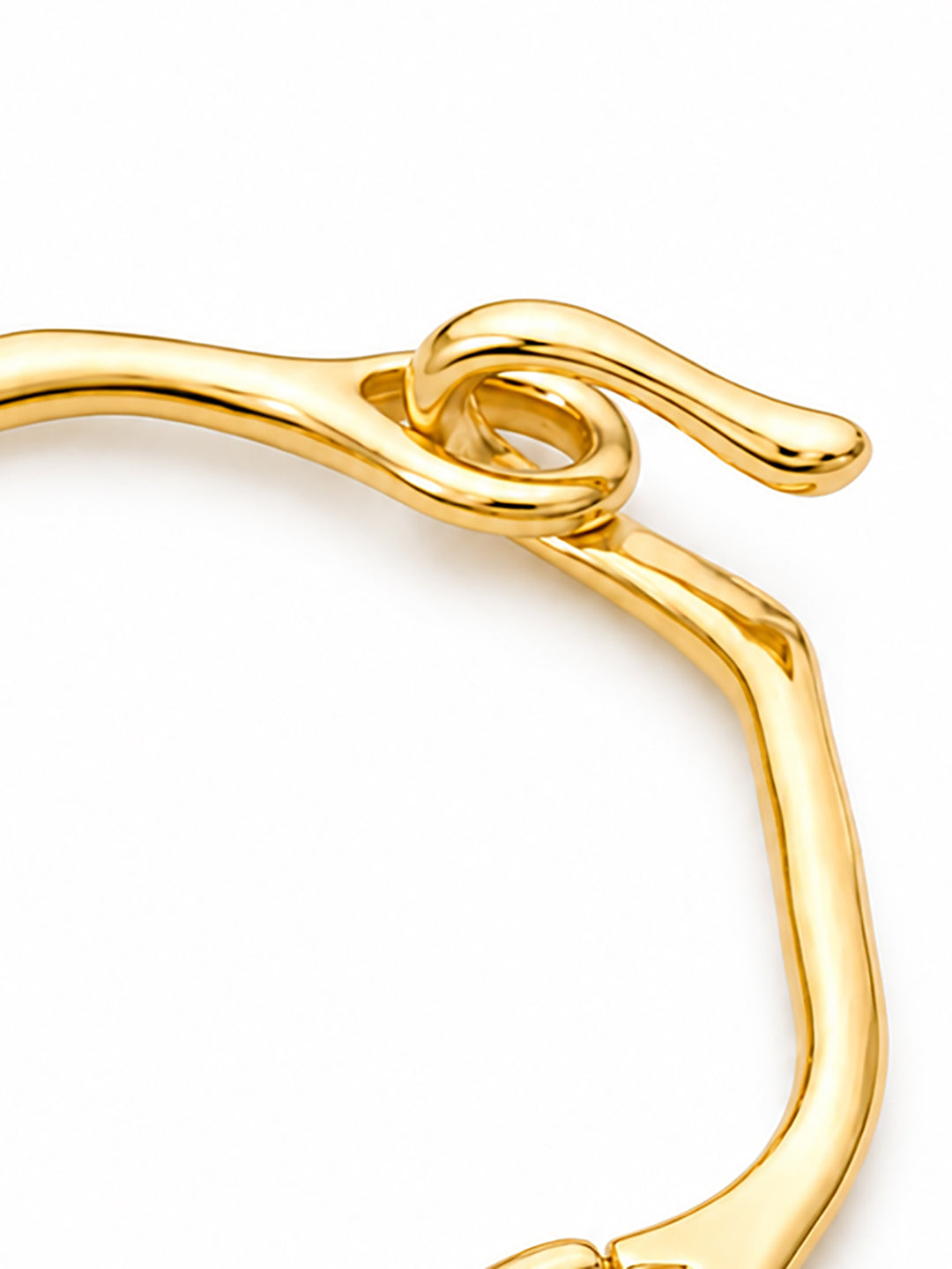 Sculptural hinged bracelet with hook closure detail