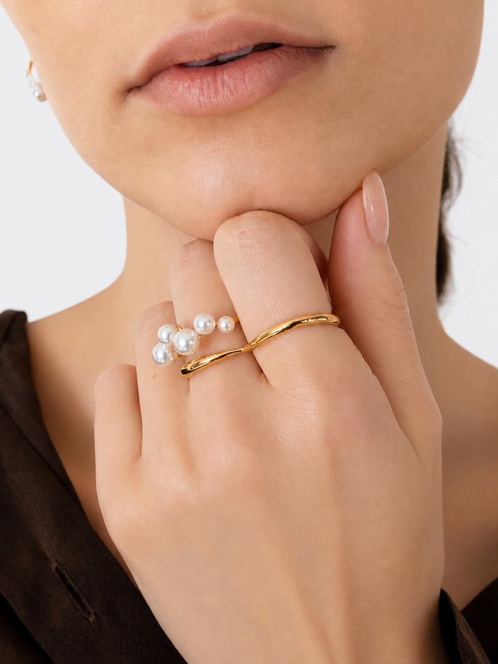 Izetta pearl ring styled on hand