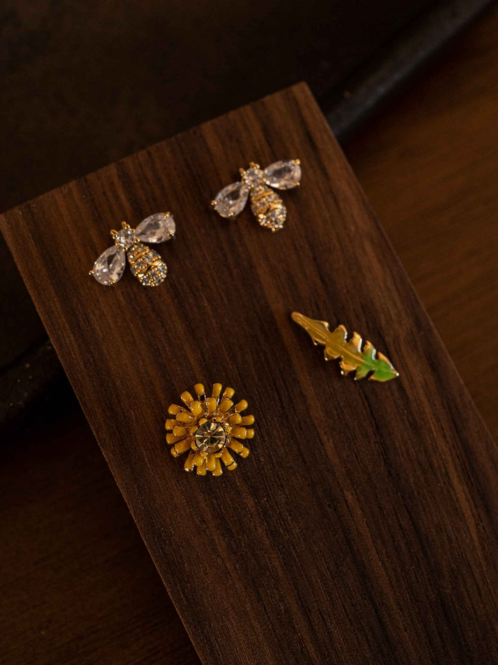 A bee and flower set of earrings