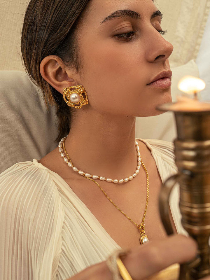 Classic Hollow Pearl Silence Gold Earrings