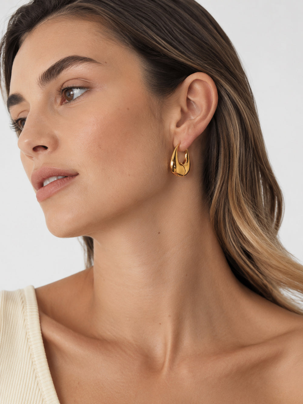 Lillian sculptural hoops styled on model
