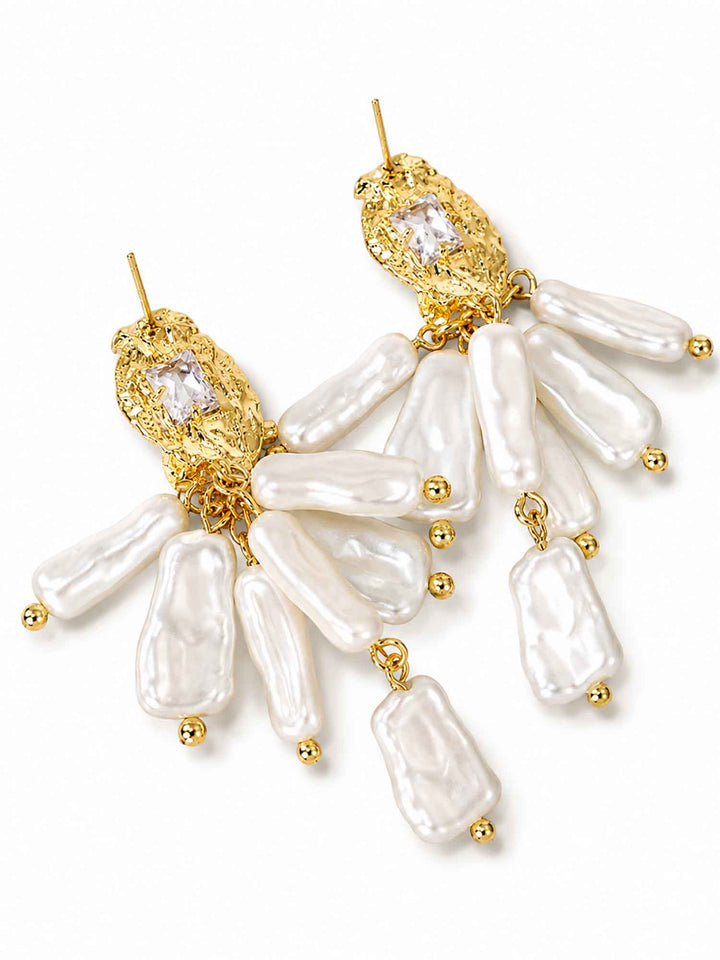 Model wearing Samira baroque pearl drop earrings with wedding styling