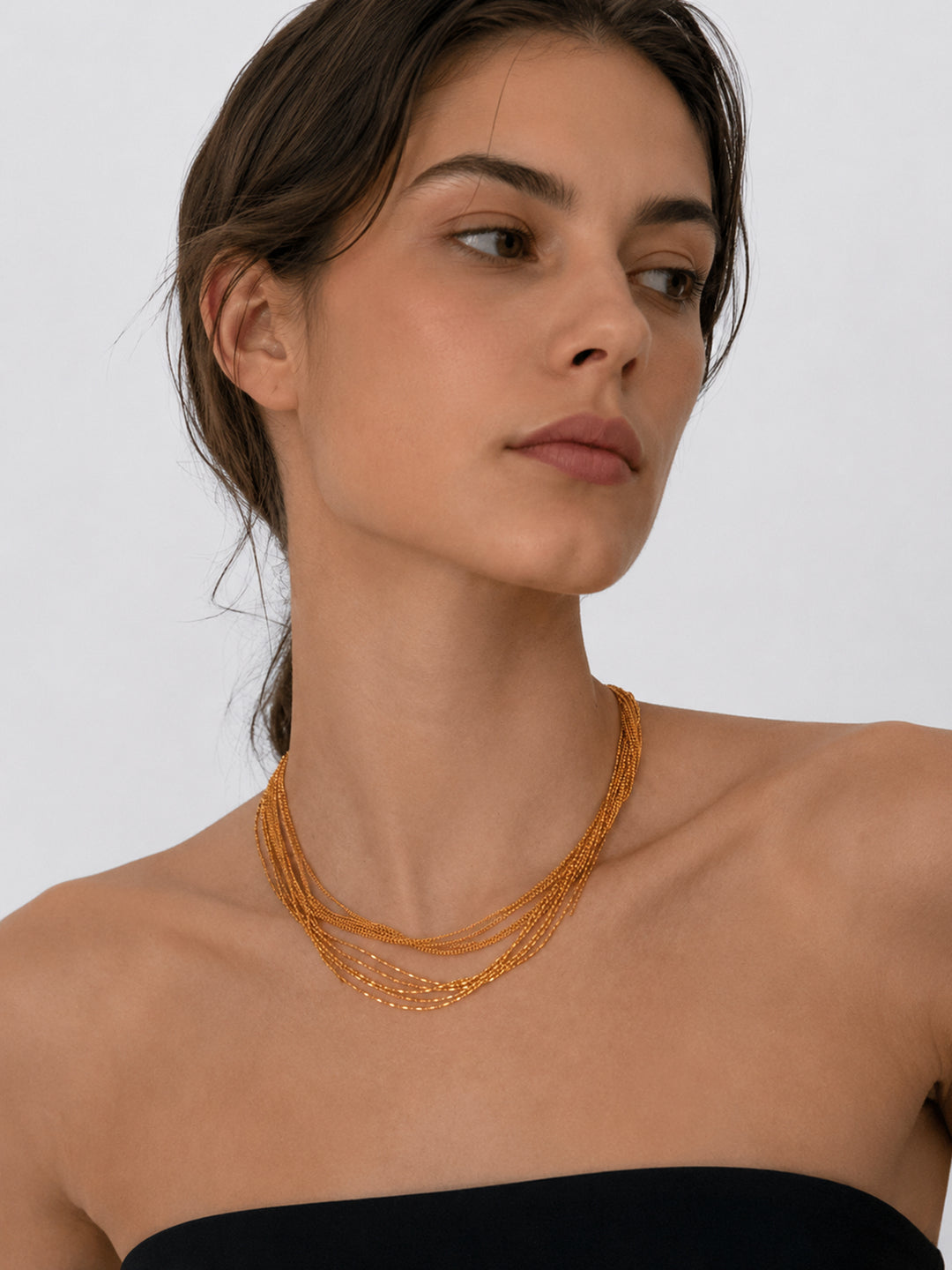 Gold-plated multi-chain necklace with adjustable extension