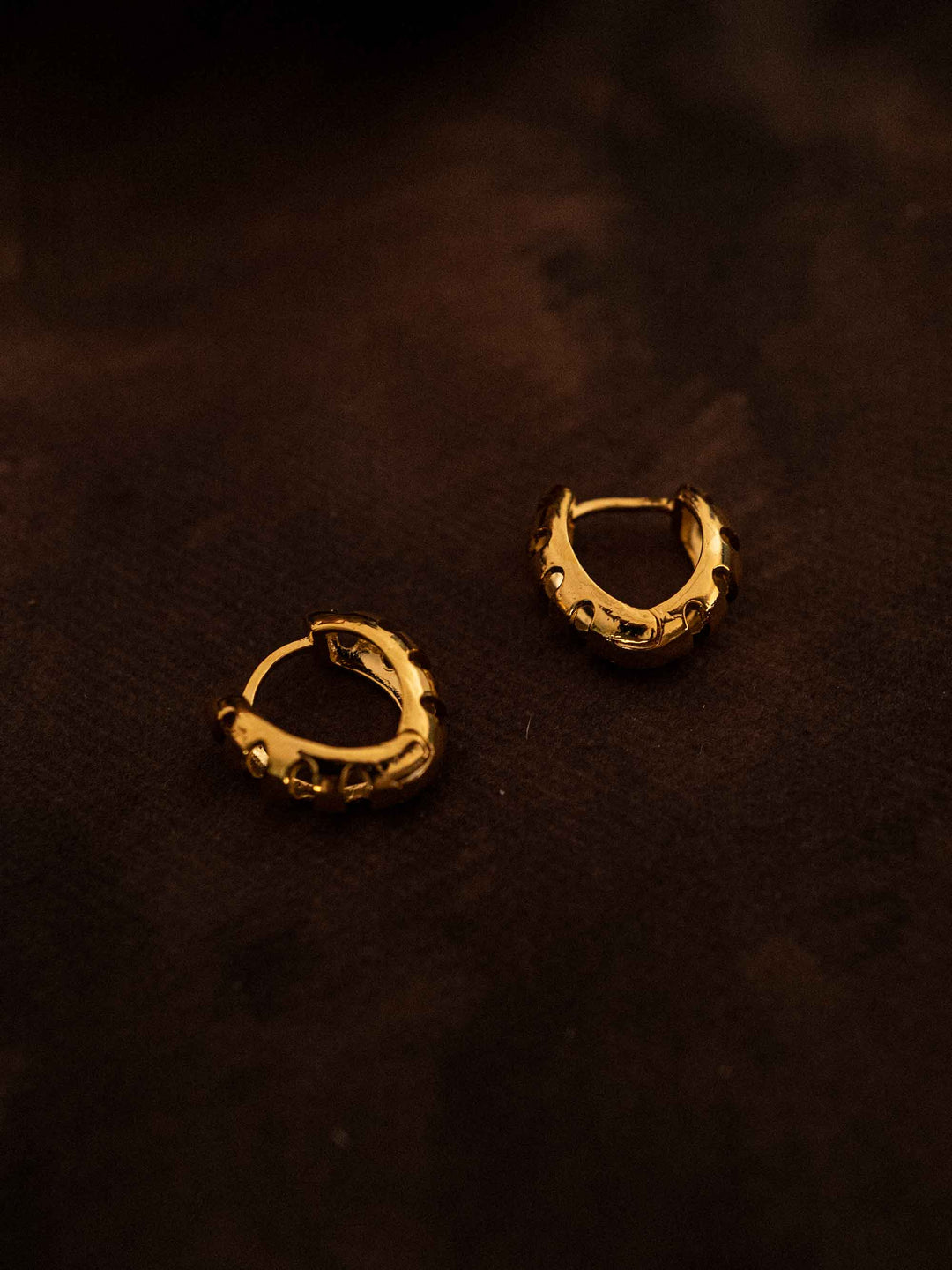 A delicate Hoop heart shaped gold earrings