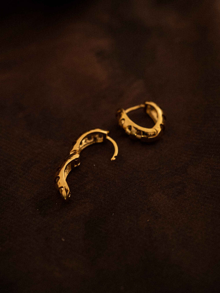 A delicate Hoop heart shaped gold earrings