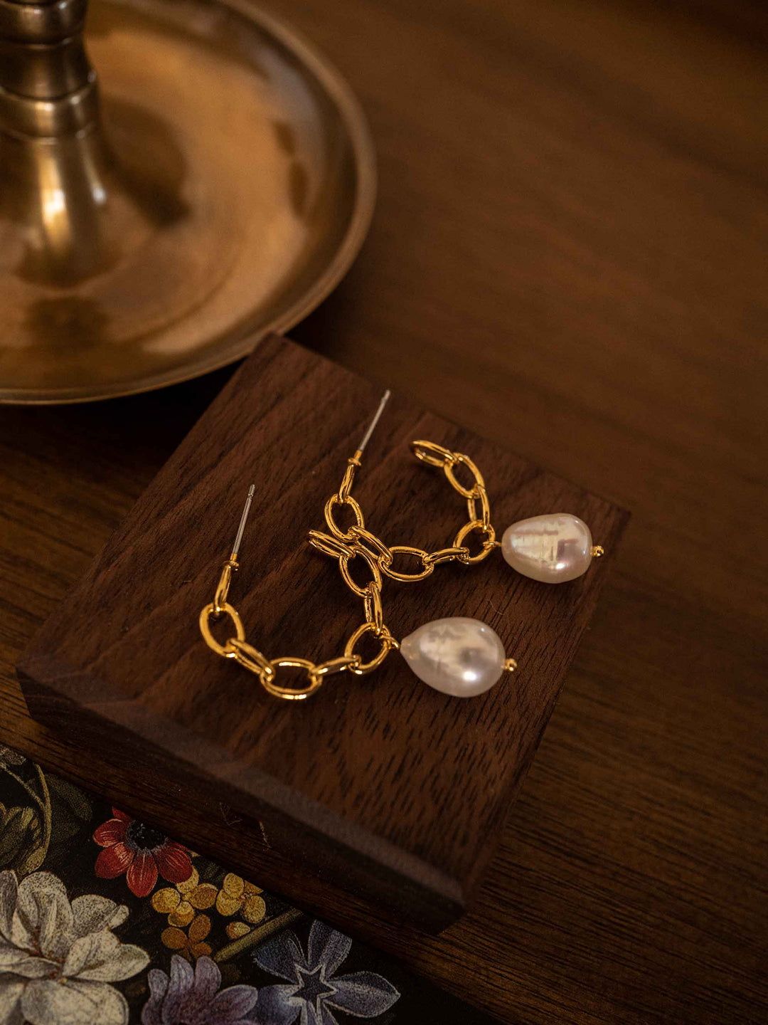 A pair of openwork twist pearl earrings