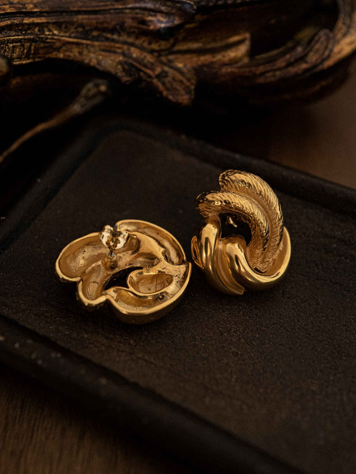 One gold earring