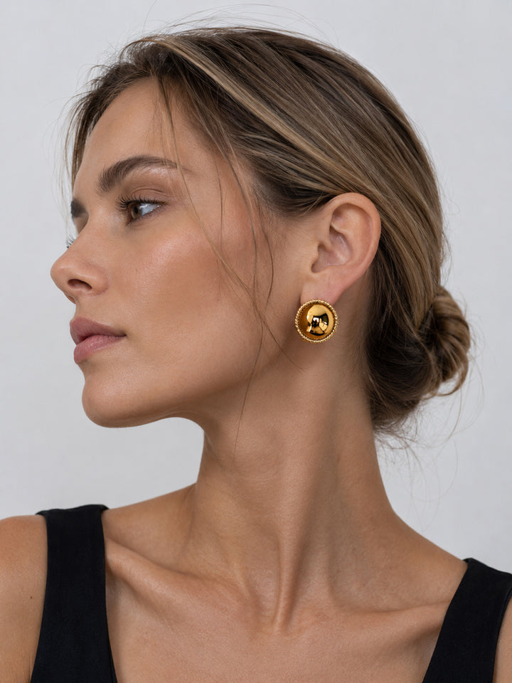 Portia crystal dome earrings styled on model