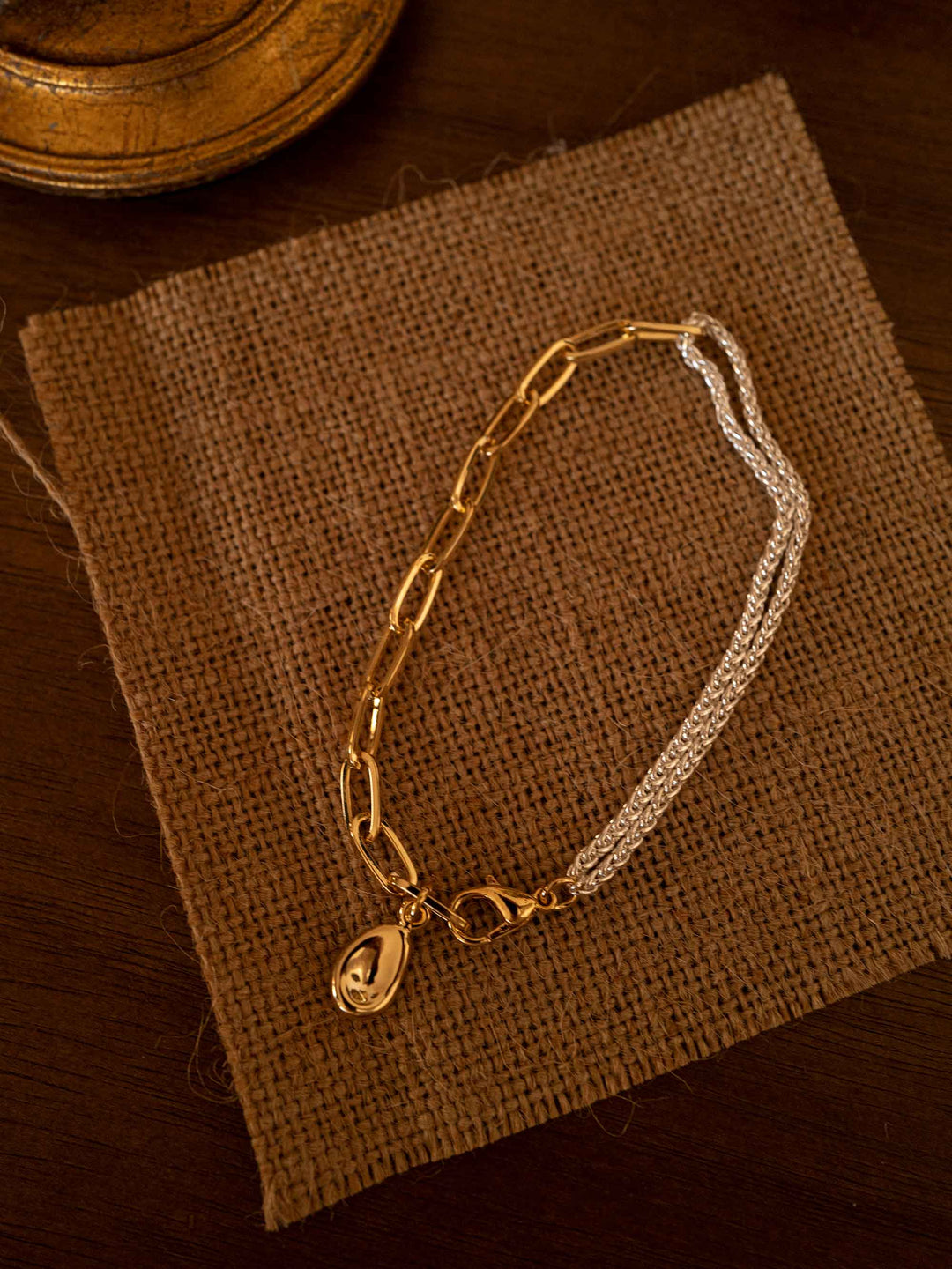 A gold and silver color matching bracelet