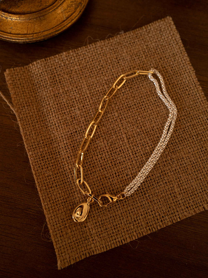 A gold and silver color matching bracelet