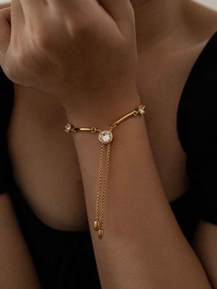 A gold bracelet with zirconia