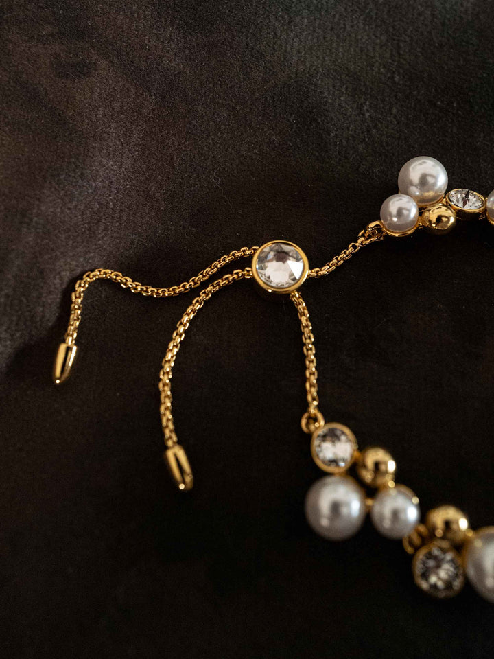 A bracelet of pearls and glass crystals