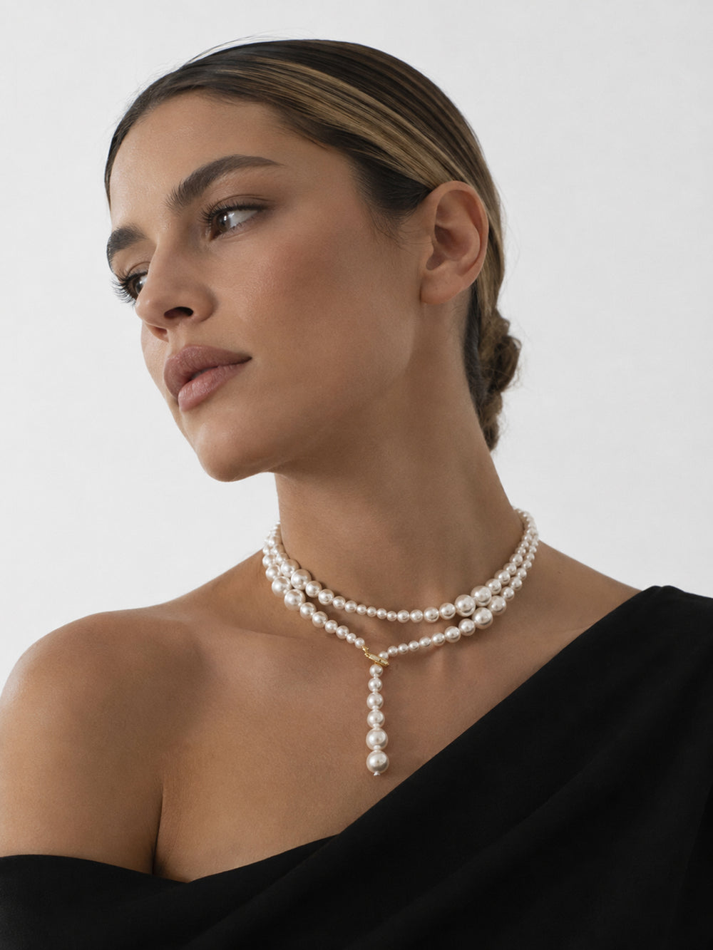 Rosaline long pearl necklace styled on model