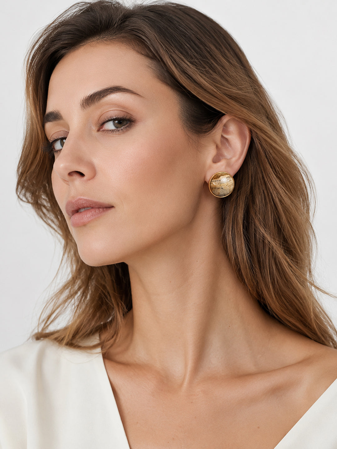 Siona stone earrings styled on model