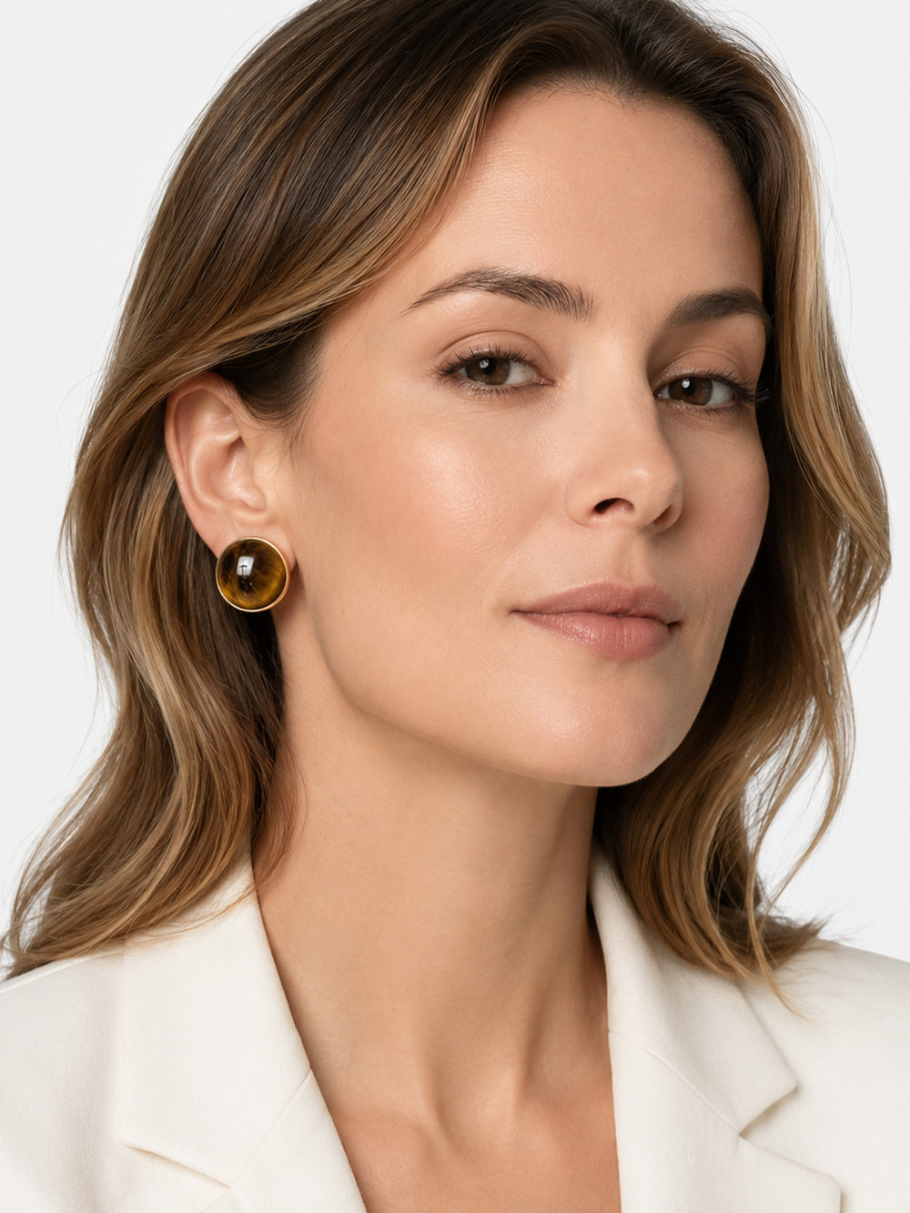 Model wearing Siona tiger’s eye stud earrings