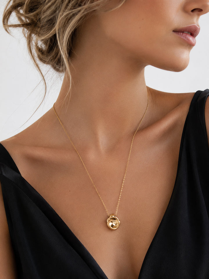 Ulelia gold pendant necklace styled on model