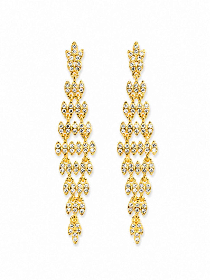 Pair of Adele gold crystal statement drop earrings on white background