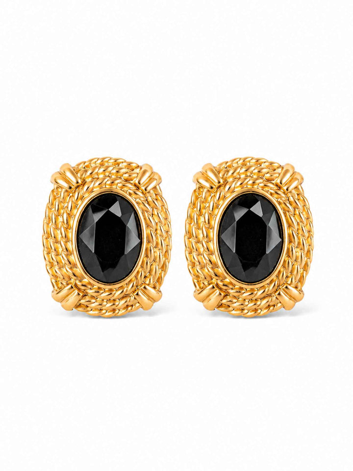 Pair of Atenea black glass statement earrings on white background