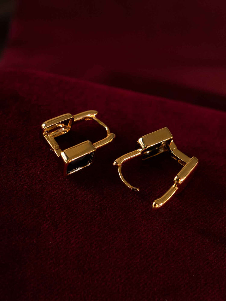 Back view of Clelia black cubic zirconia hoop earrings with gold-plated