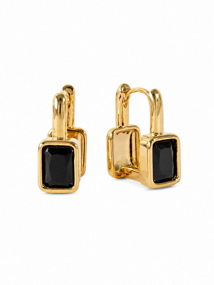 Pair of Clelia black cubic zirconia hoop earrings on white background