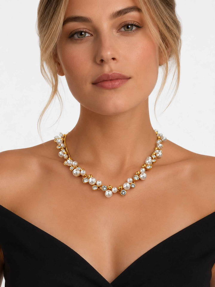 Model wearing Elspeth imitation pearl glass crystal necklace with black outfit