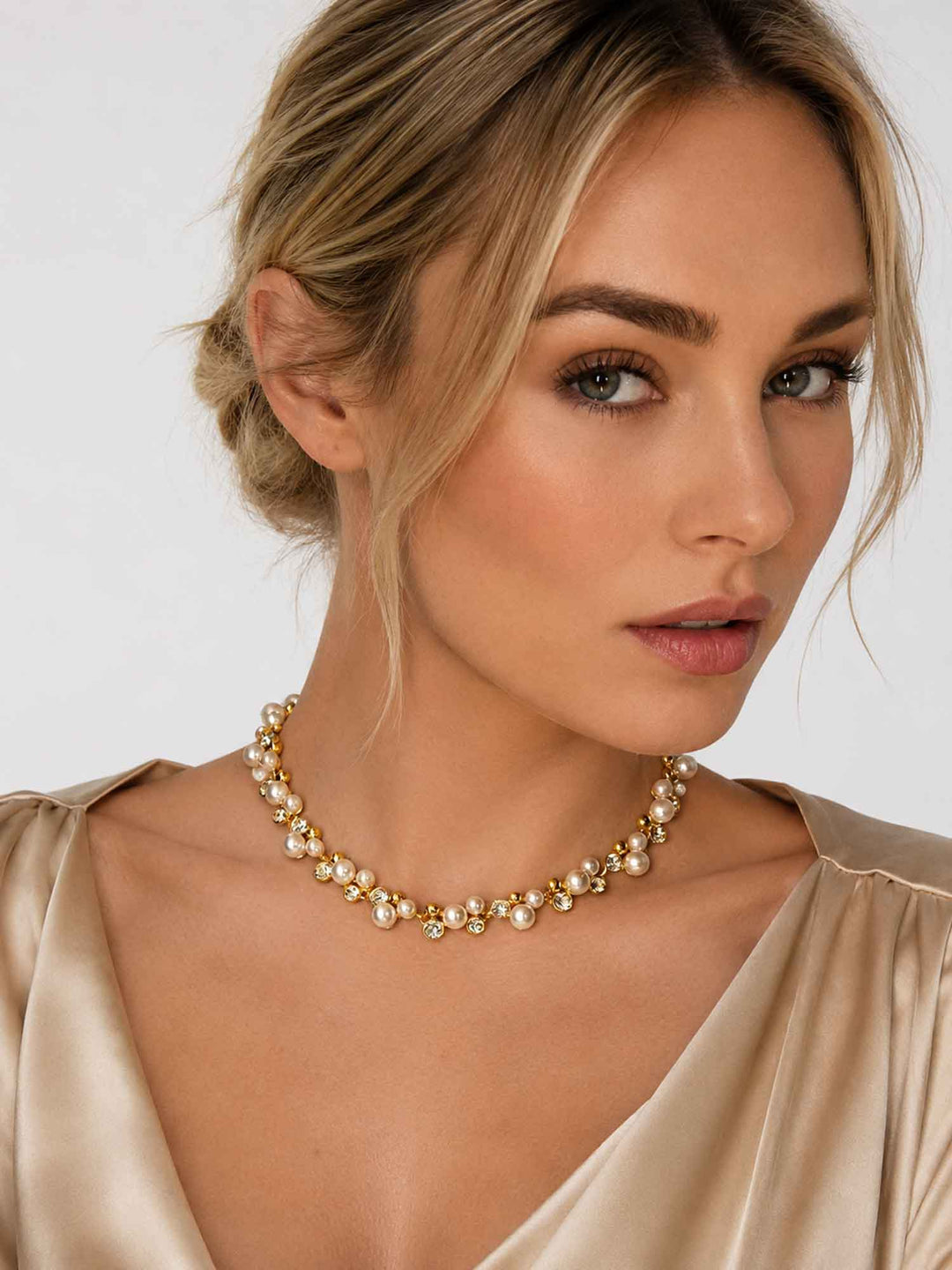 Model wearing Elspeth imitation pearl glass crystal necklace with light outfit