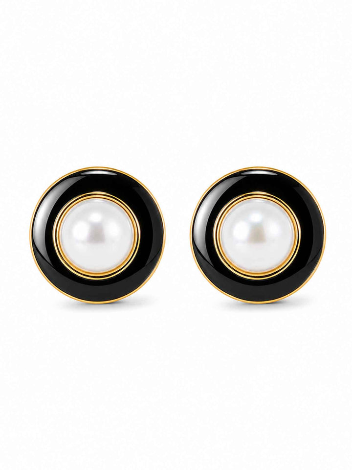 Pair of Kason black enamel pearl stud earrings on white background