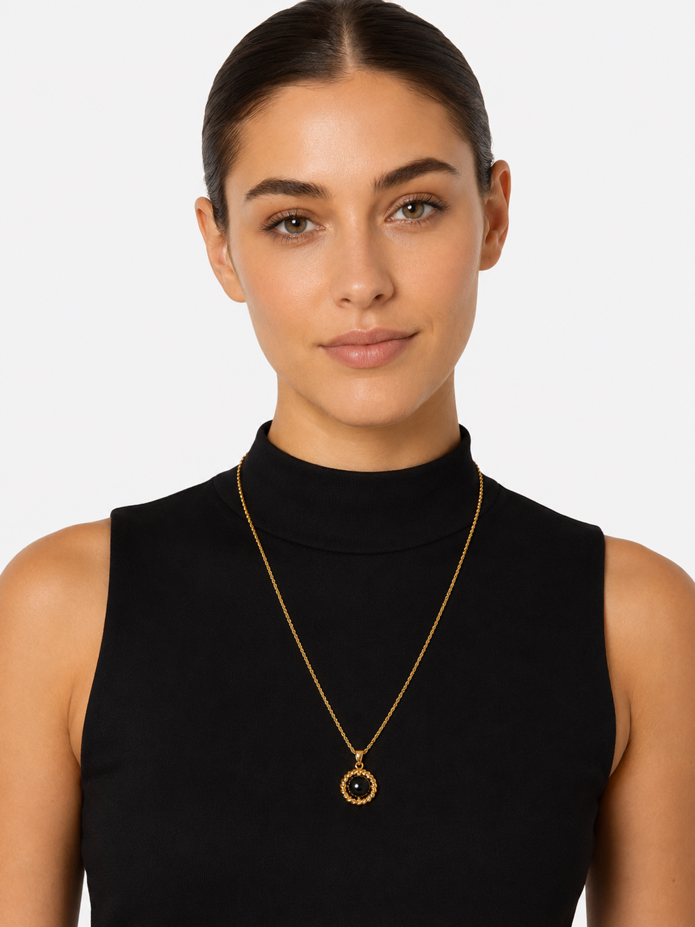 Model wearing Melina black acrylic gold pendant necklace with elegant styling