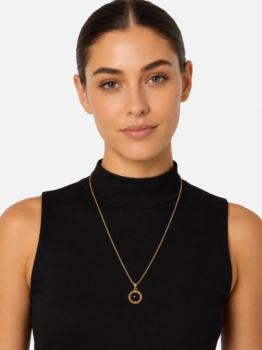 Model wearing Melina black acrylic gold pendant necklace with elegant styling