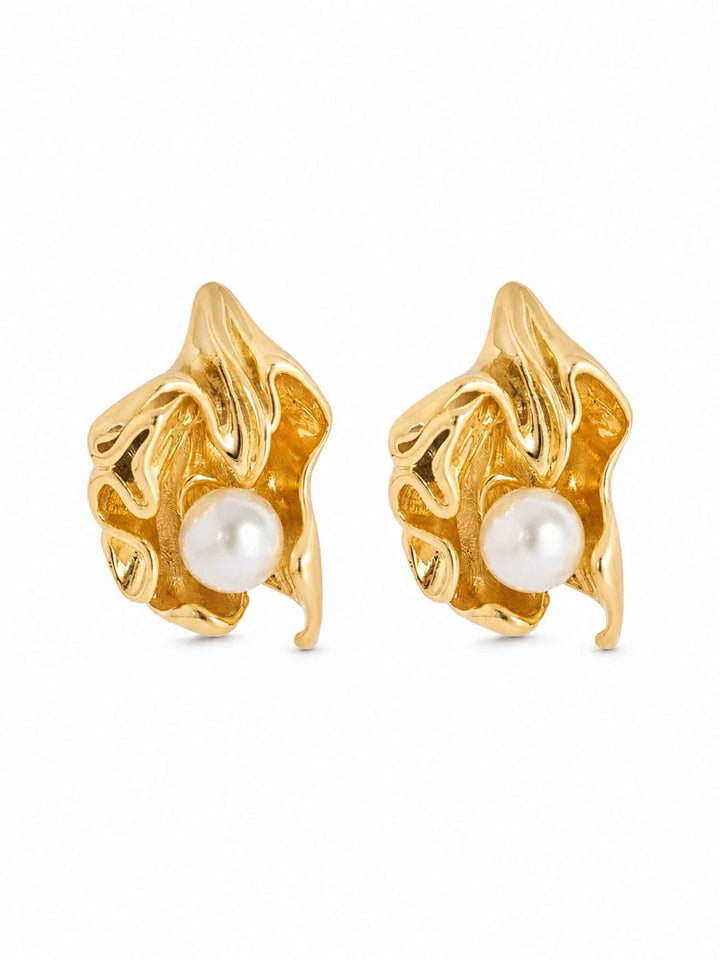 Pair of Minette sculptural pearl gold stud earrings on white background