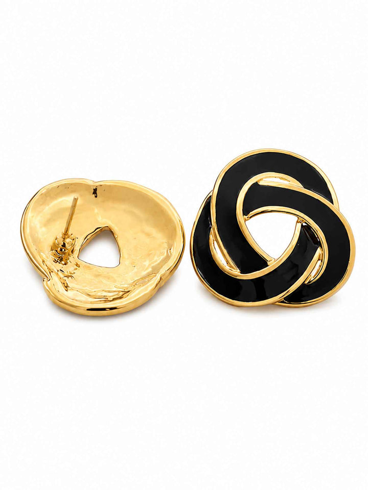 Back view of Nimah black enamel knot stud earrings with surgical-steel posts