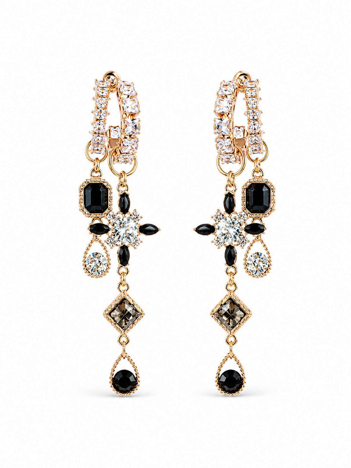 Pair of Oliviana black crystal chandelier earrings on white background