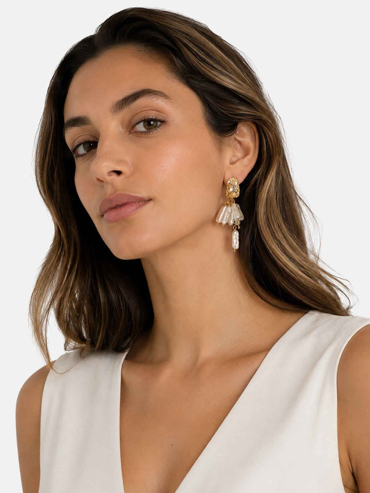 Model wearing Samira baroque pearl drop earrings with wedding styling