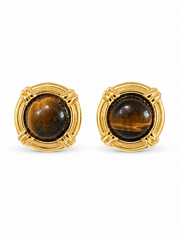 Pair of tiger eye stone gold stud earrings on white background