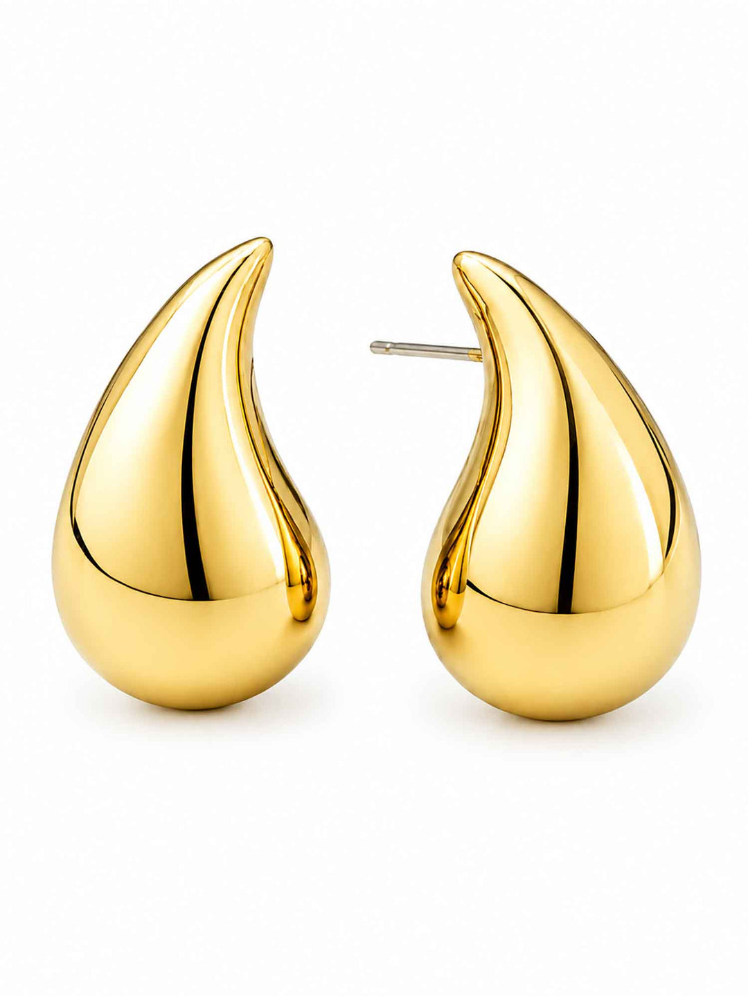 Pair of Titania large gold teardrop earrings on white background